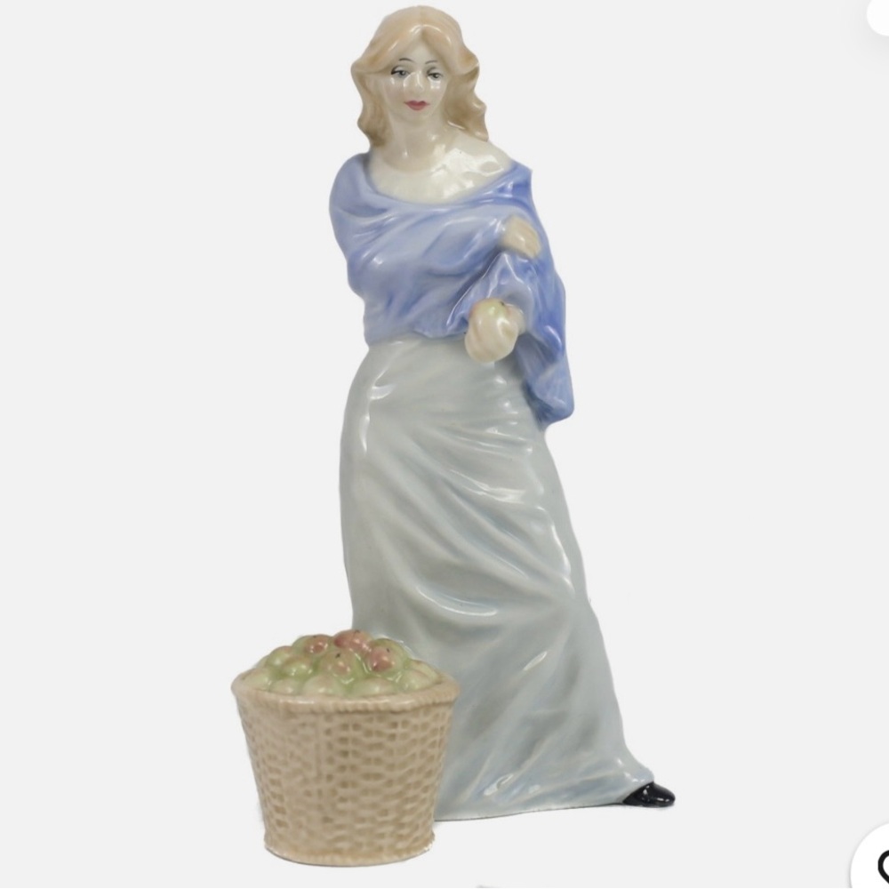Royal Doulton Harvest Time figurine.